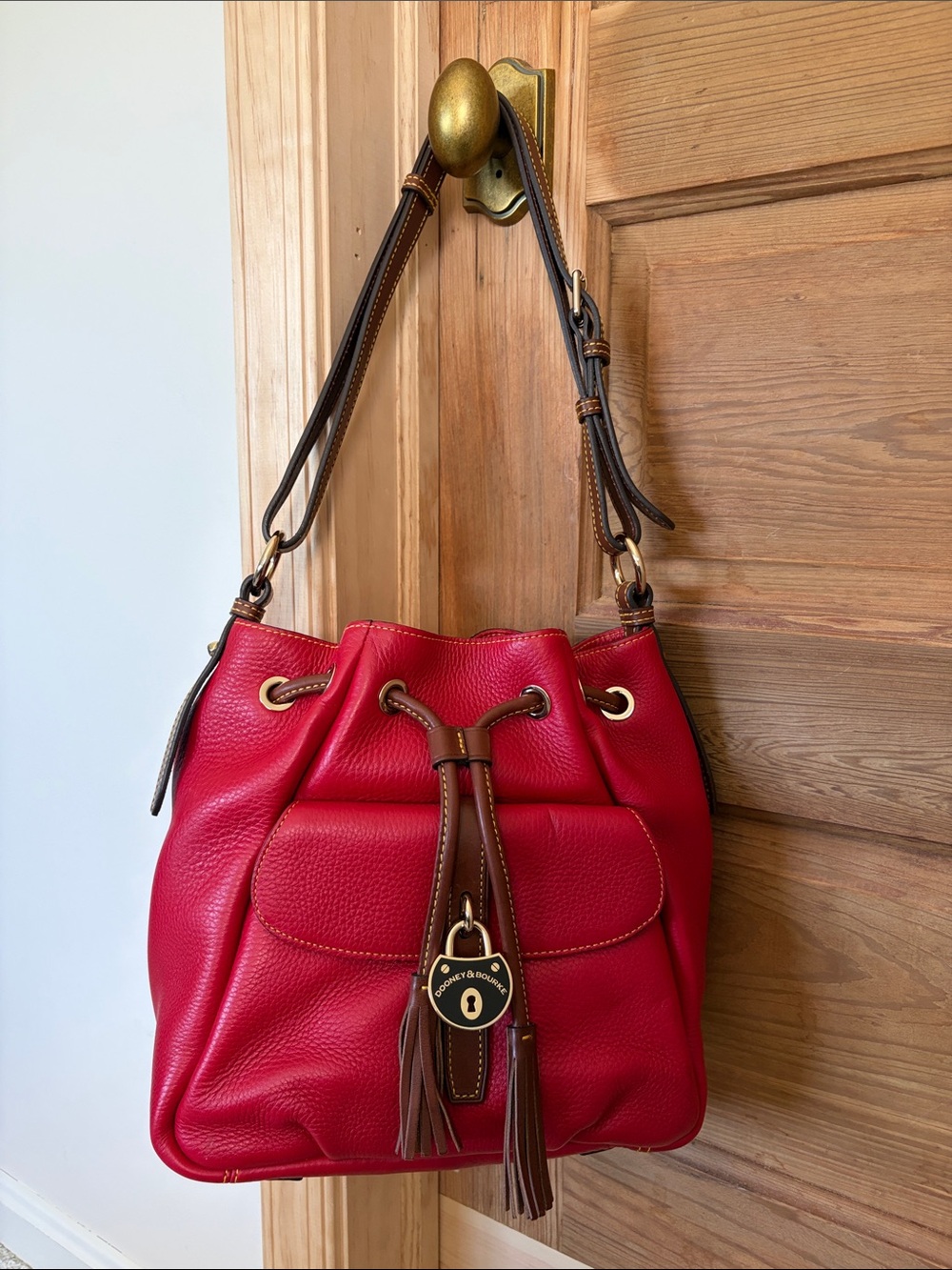Dooney & Bourke Red Pebble Leather Drawstring Shoulder Bag with Brown Trim